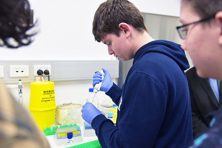 A Student from Kingaroy State High School using a pipette