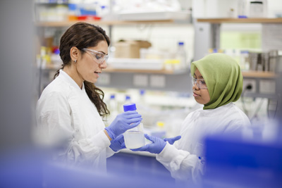 AIBN PhD student Nasim Amiralian with Khairatun Najwa Mohd Amin