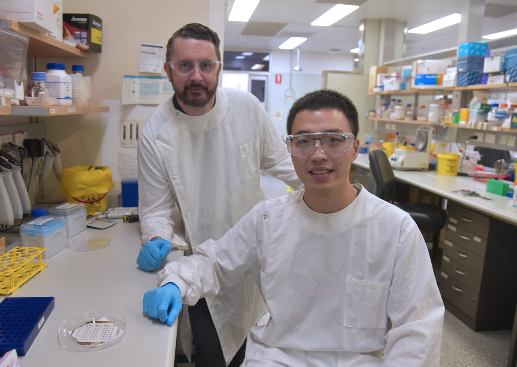 AIBN researchers Dr Richard Lobb and Quan Zhou are working on technology that reads sugar molecules to detect the early signs of lung cancer. 