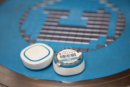 he Nanopatch applicator and a large version of the patch.