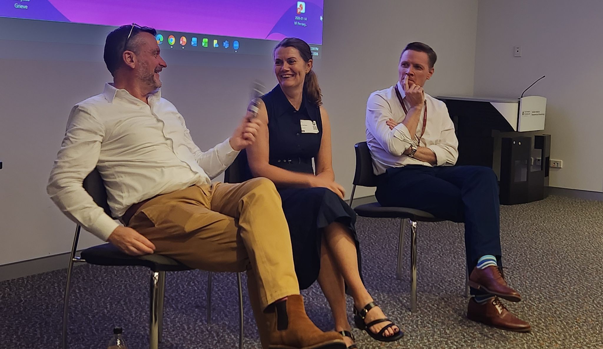 Jason at panel discussion at AMTAR event